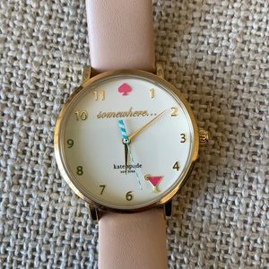 Kate Spade watch with tan band.